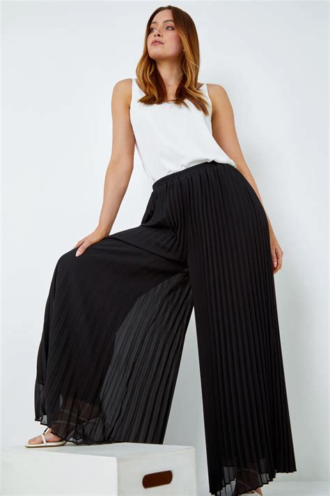 black pleated wide leg trousers.